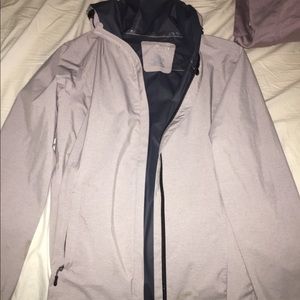 Cute light grey rain jacket with hood and pockets